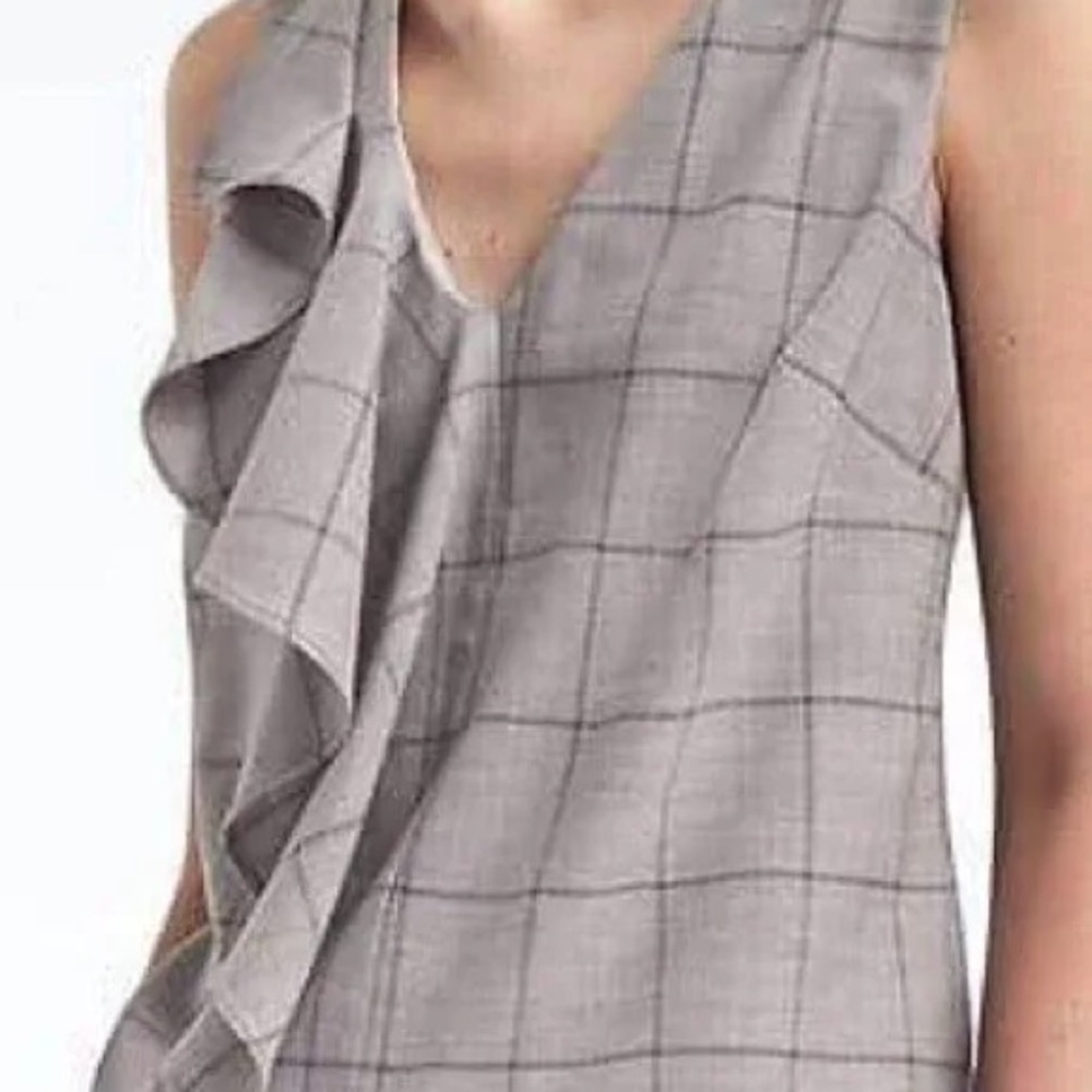 Windowpane plaid ruffle front blouse